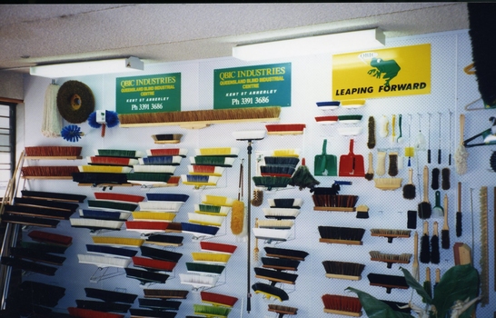 QBIC Industries broom display board