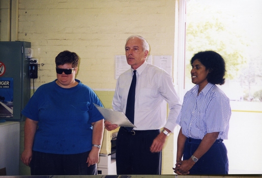 Peter Lynam presenting Vanessa Hinton and Jaina Unmoepa with their certificates