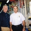 Herb with hardware store staff member