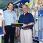 Herb with hardware store staff member
