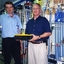 Herb with hardware store staff member