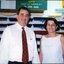 John Puttick stands with Anna Bligh in front of brush head wall