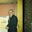 John Puttick receiving a cheque from an AMP representative