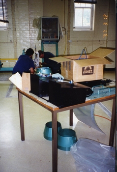 Unknown workers on factory floor
