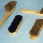 Various brushes made by QBIC Industries