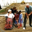 Mary Tiernan and her family look on as Rex Hollioake turns the sod