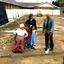 Mary Tiernan and her family look on as Rex Hollioake turns the sod