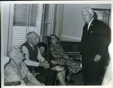 Sir Rohan chats with some nursing home residents