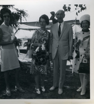 Three ladies and man outside the marquee