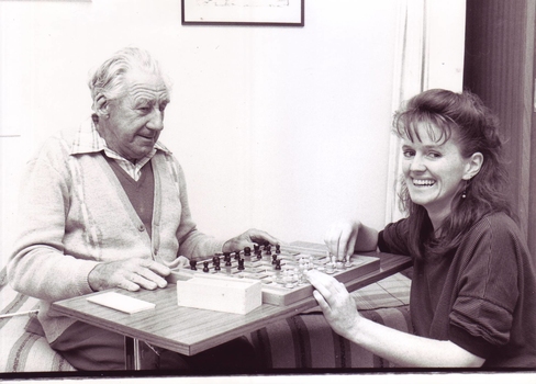 Two people playing chess at Mirridong