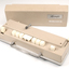 Beige rectangle box with cream buttons and silver return lever