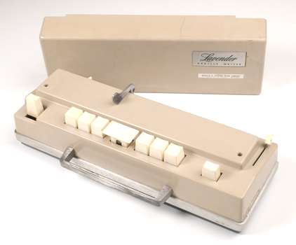 Beige rectangle box with cream buttons and silver return lever