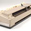 Beige rectangle box with cream buttons and silver return lever