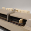 Beige rectangle box with cream buttons and silver return lever