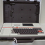Cream keyboard with brown keys, 'Keynote' written on side, red line and cassette unit above keys