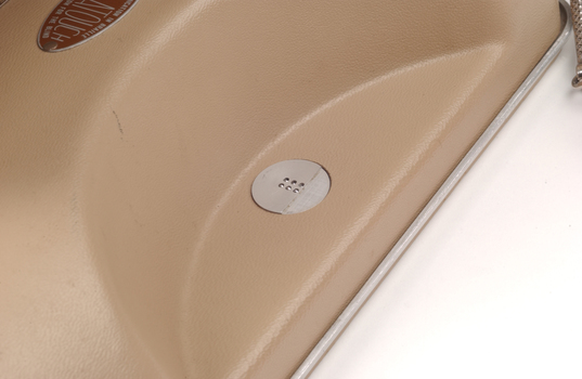 Close up of 6 Braille dots at rear of machine