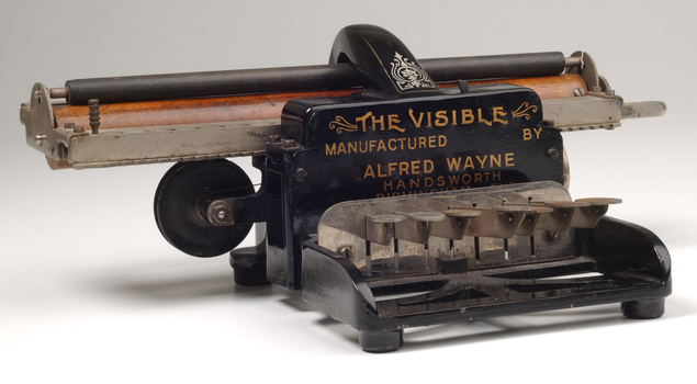 Black brailler with metal keys and wooden roller