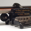 Black brailler with metal keys and wooden roller
