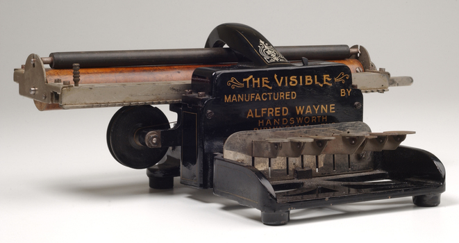 Black brailler with metal keys and wooden roller