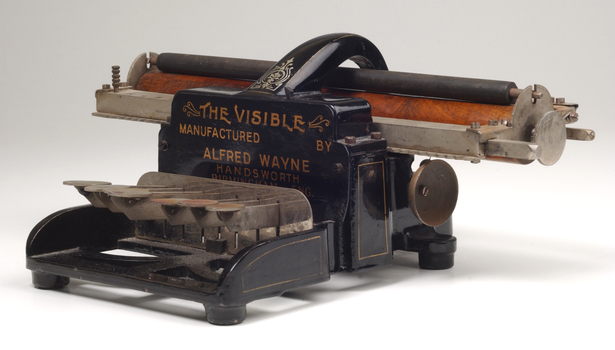 Black brailler with metal keys and wooden roller