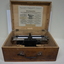 Wooden box with metal Braille typewriter