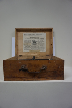 Wooden box with metal Braille writer
