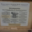 Paper attached to lid of box in German, describing use and care of typewriter