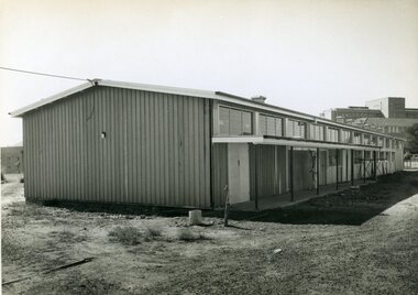 Recently completed wooden building with verandah