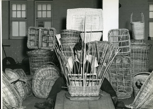 One man making a wicker basket