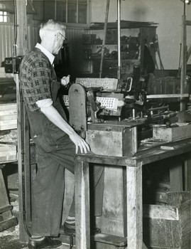 Snowy Willis operating a semi automatic brush stock boring machine