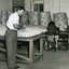 Male and female worker in the mattress shop