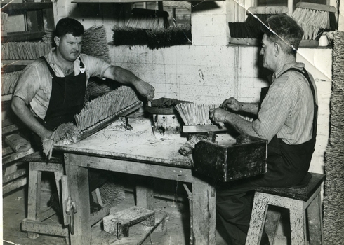 Brush shop - pitch set brooms being made by blind workers