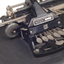 Metal Braille typewriter attached to rectangle base board