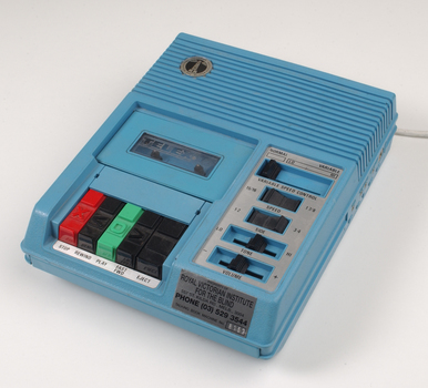 Blue plastic rectangular talking book player with buttons for navigational controls