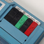 Close up of 5 buttons with tactile markers