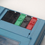 Close up of 5 buttons with tactile markers