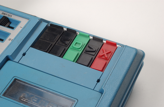 Close up of 5 buttons with tactile markers