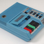 Blue plastic rectangular talking book player with buttons for navigational controls