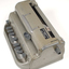 Metal Braille writer with nine grey keys, carriage return key and paper rollers on either side