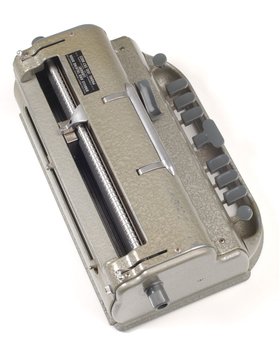 Metal Braille writer with nine grey keys, carriage return key and paper rollers on either side