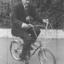 Man riding kids Mitchell cycle