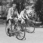 Two men riding Mitchell cycles