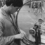 Worker at Mitchell cycles, putting together a wheel rim