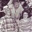 Two residents laugh with a staff member