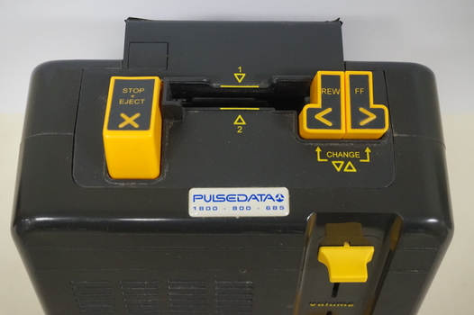 Black box with yellow buttons and dials