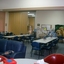 Tables, chairs and lounge in day centre