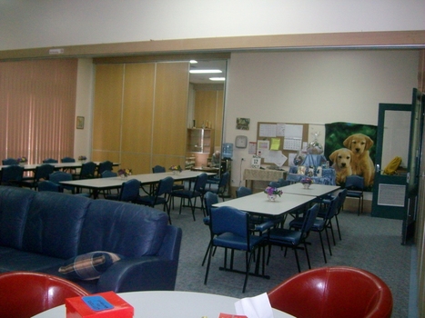 Tables, chairs and lounge in day centre