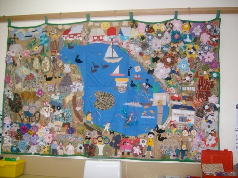 Wall hanging of sewn pieces creating a map of Ballarat with Lake Wendouree