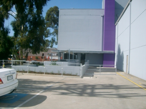 Facing reception from car park with dog run in foreground