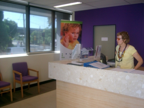 Reception area with Lynette Clarke behind the desk